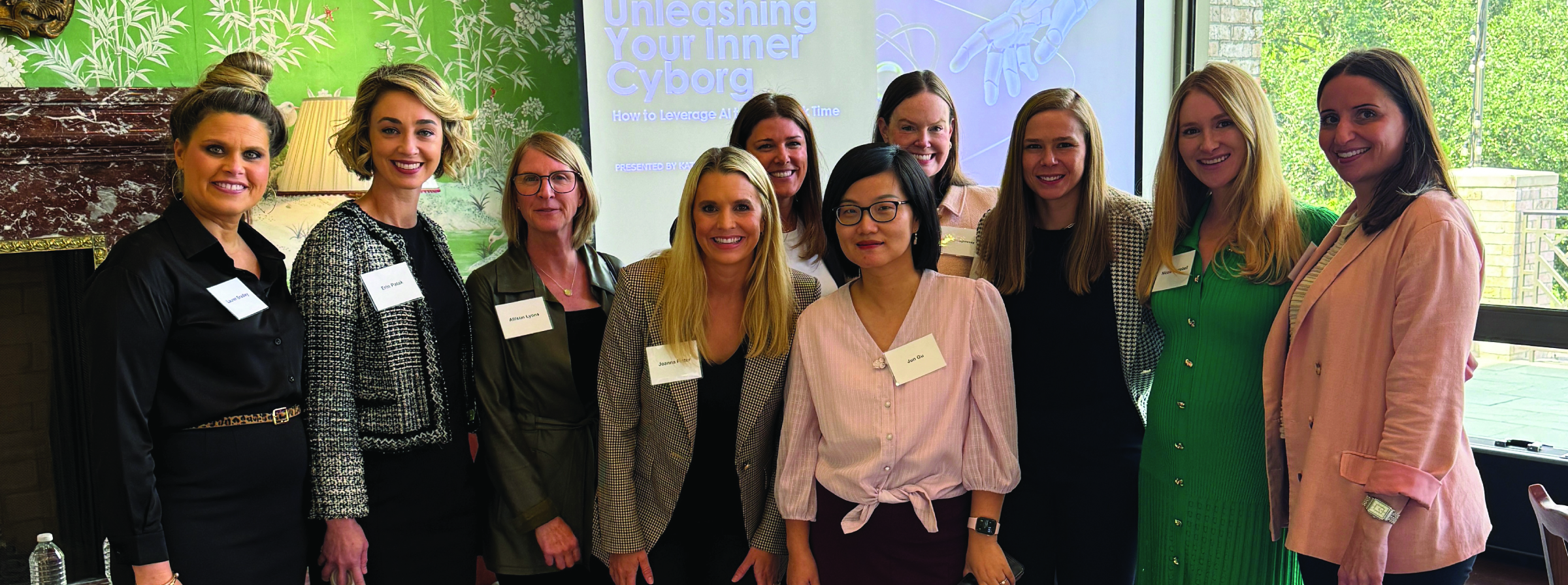 Women at at event posing for a picture